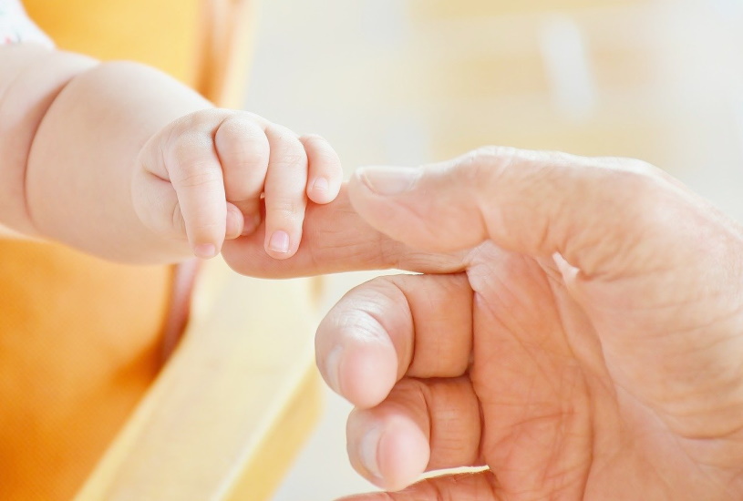 Ein Baby bedeutet viel Freude und lebenslange Verantwortung