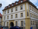 Der ehemalige Gasthof Zur Blauen Traube wurde im 18. Jahrhundert errichtet und ist ein denkmalgeschtztes Gebude in der Altstadt. Das Gasthaus war ab 1804 auch Sitz der Schrferbru.